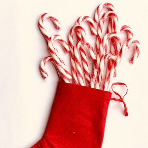 Red Christmas stocking stuffed with candy canes